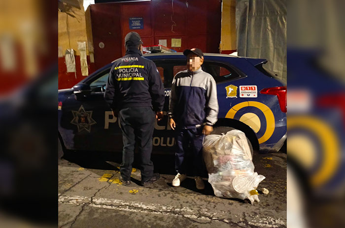 hombre detenido tirar basura