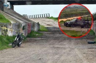 Policías resguardaron la zona del Río Lerma mientras personal de la Fiscalía y cuerpos de emergencia realizaron las diligencias correspondientes.