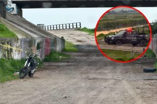 Policías resguardaron la zona del Río Lerma mientras personal de la Fiscalía y cuerpos de emergencia realizaron las diligencias correspondientes.