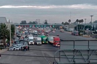 A la protesta también se sumaron operadores de grúas y conductores de transporte de carga de la ACME