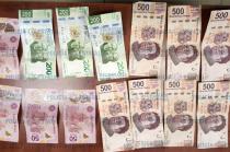 Se aseguró dinero en efectivo y una trampa utilizada en el dispensador de billetes