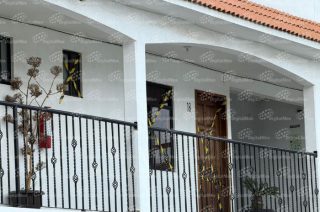 Habitación 18 del hotel Villa Meztli, asegurada y sellada por autoridades ministeriales.