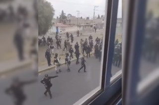 Agresión a policías durante cateo 