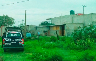 Hallan a mujer degollada en pulquería de Tezoyuca