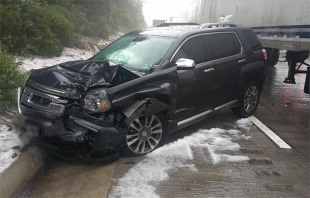 ﻿Granizada provoca percances en la México-Puebla; nueve autos dañados