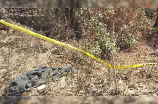 Autoridades acordonaron el área donde fue hallado el cuerpo