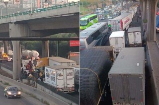 El accidente se registró en los carriles centrales de la vía, donde el vehículo pesado terminó impactado contra el muro de contención.