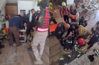 Bomberos rescataron a dos trabajadores intoxicados dentro de una cisterna en Texcoco.