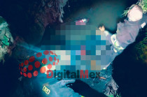 El hallazgo ocurrió en la calle Palmas y Jhona, en las inmediaciones de la carretera que conduce al zoológico de Zacango, cuando un vecino detectó el cuerpo dentro del canal y dio aviso a las autoridades.