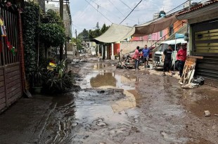 Inundacion en Ecatepec deja pozo inservible