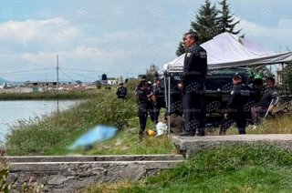 Buzos del SUEM recuperaron el cuerpo del joven en la laguna de San Jerónimo, en San Pablo Autopan, Toluca.