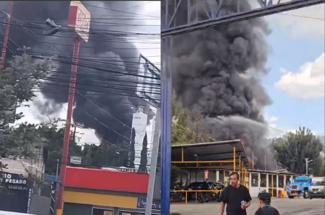 La densa columna de humo se elevó tras el incendio en una fábrica de pinturas