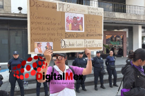 Cartel exhibido durante la marcha del 8M en Ecatepec donde se denuncia públicamente al diputado del PT