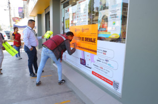 Sellos de restricción colocados por Sapase en establecimientos de Ecatepec